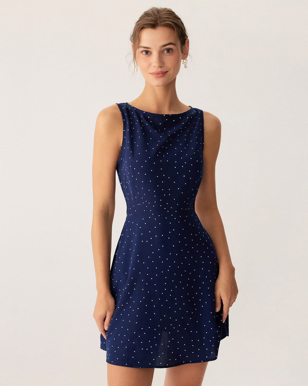 Vestido mini sin mangas con cuadrados y puntos azules